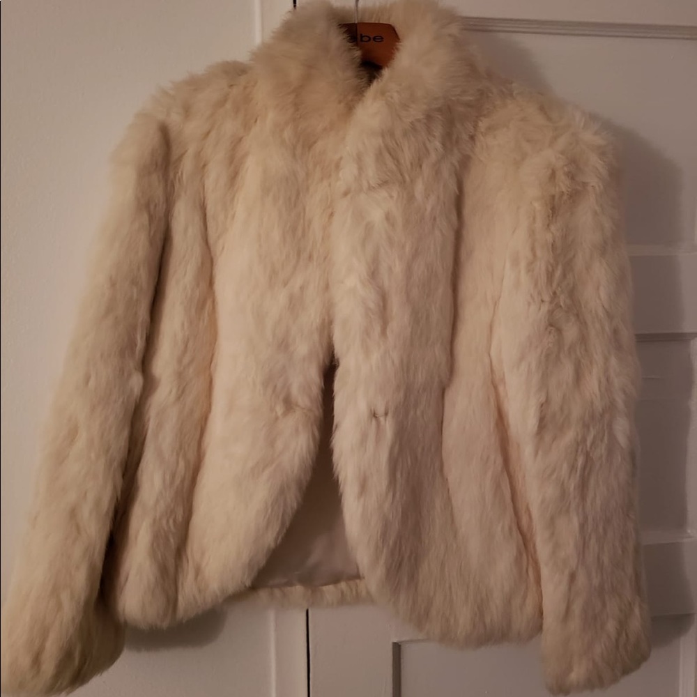 Warm rabbit coat. Blazer style with side pockets